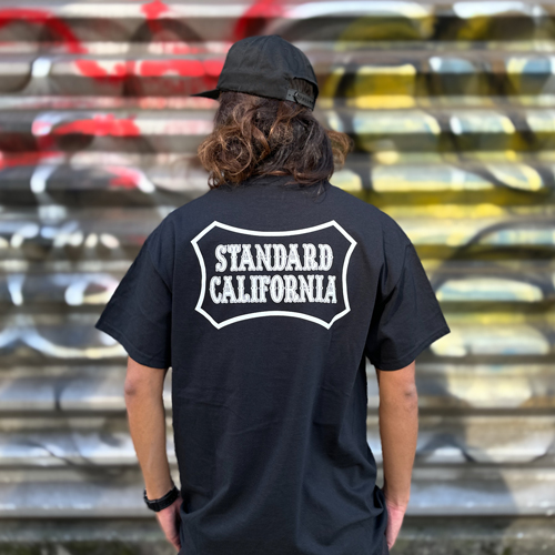 VANS × STANDARD CALIFORNIA [バンズ×スタンダードカリフォルニア] Logo T 20th Anniversary.  [WHITE